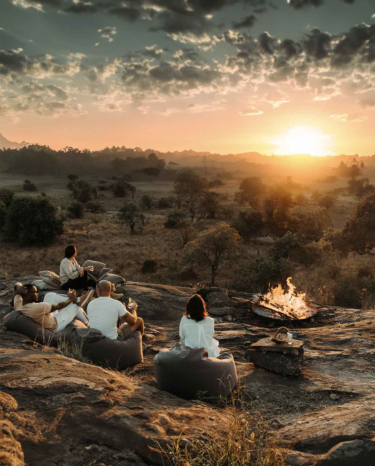 A refreshing gin and tonic as you sit back on a plush beanbag atop a kopje and toast the magnificent setting sun in sensational African style.