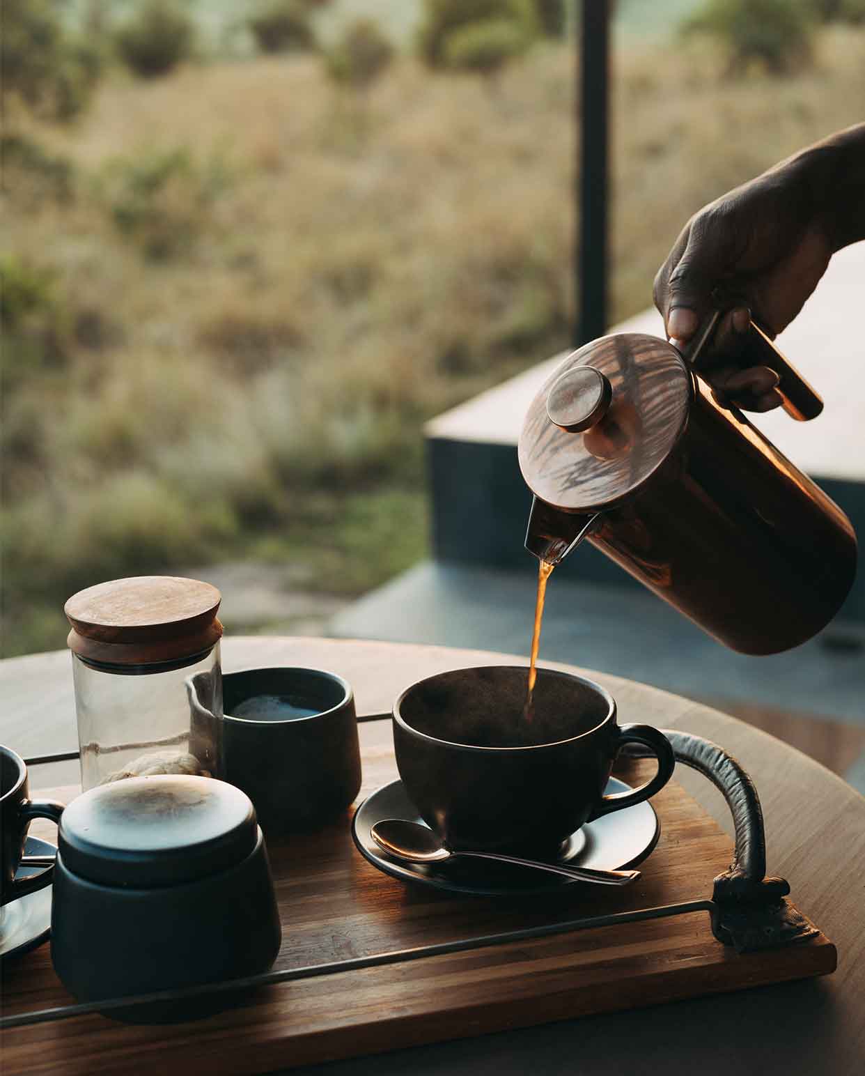 The delicious, rich aroma of local coffee brewing as you alight from your game drive vehicle for a fabulous bush breakfast overlooking the plains of the northern Serengeti.